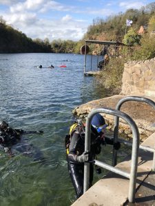 Students on a quarry dive title=